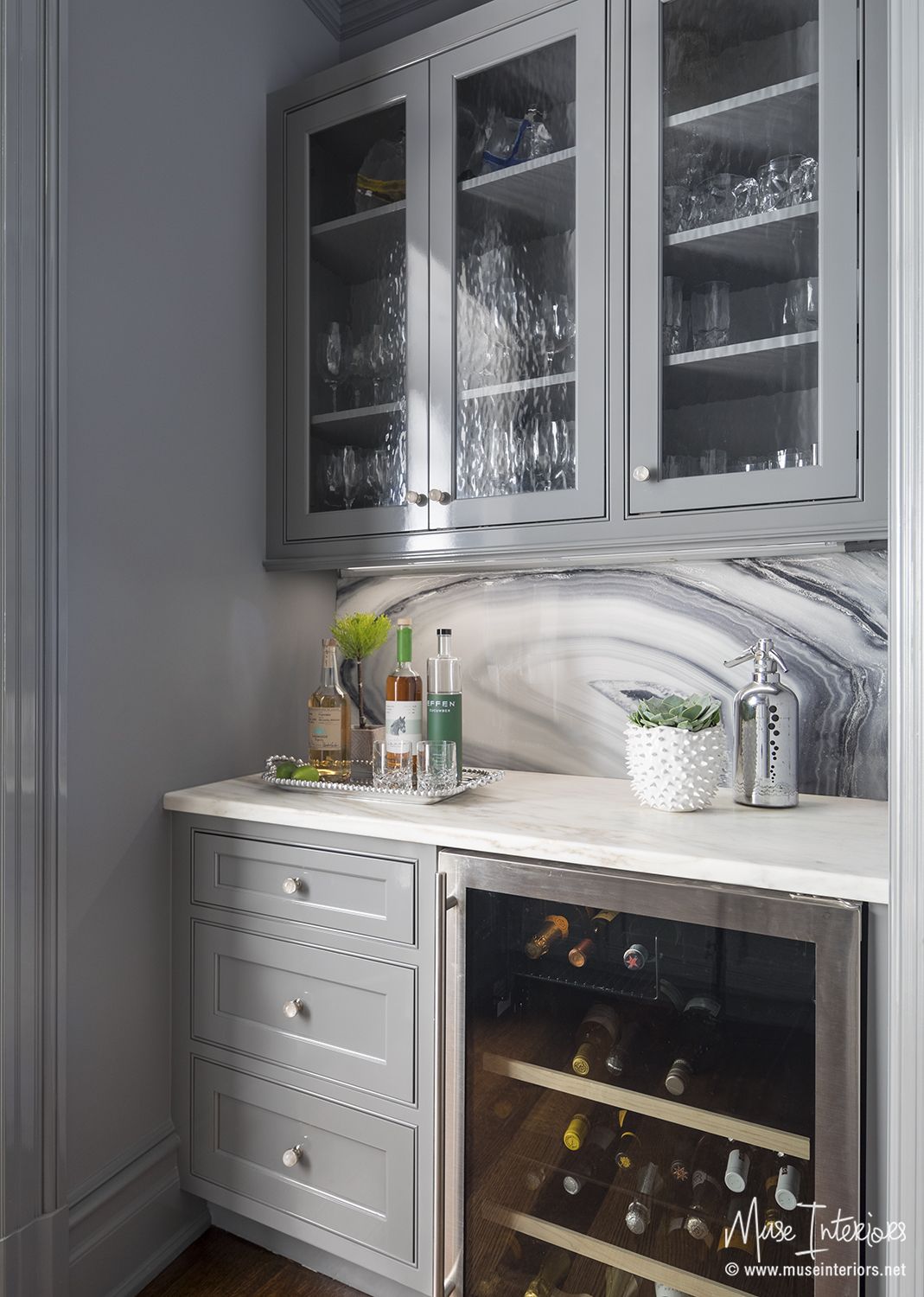 painted gray cabinets with black and white backsplash